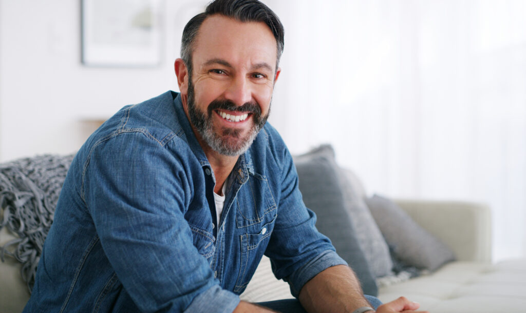 middle aged man relaxing at home